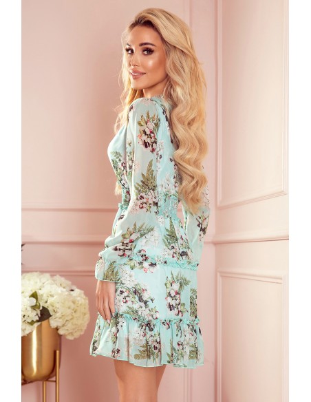  421-2 Chiffon dress with frills and a wide elastic band - flowers on a green background 