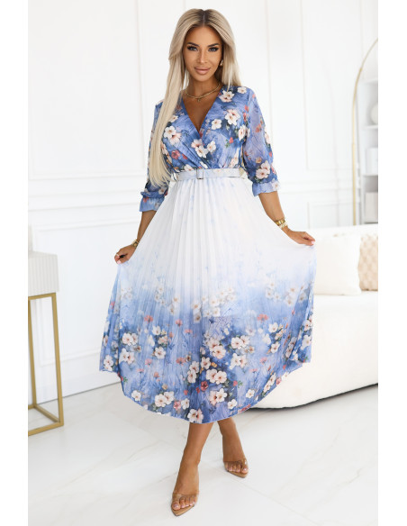 605-1 Moteriška erdvi midi suknelė su voko formos iškirpte ir klostėmis šviesiai mėlyna su lauko gėlėmis   605-1 Moteriška erdvi midi suknelė su voko formos iškirpte ir klostėmis šviesiai mėlyna su lauko gėlėmis