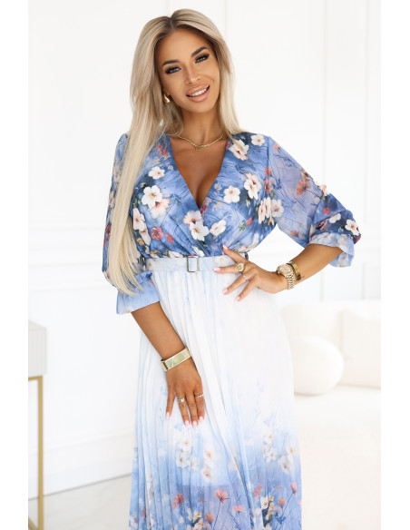 605-1 Moteriška erdvi midi suknelė su voko formos iškirpte ir klostėmis šviesiai mėlyna su lauko gėlėmis   605-1 Moteriška erdvi midi suknelė su voko formos iškirpte ir klostėmis šviesiai mėlyna su lauko gėlėmis