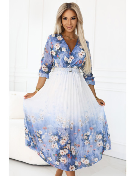 605-1 Moteriška erdvi midi suknelė su voko formos iškirpte ir klostėmis šviesiai mėlyna su lauko gėlėmis   605-1 Moteriška erdvi midi suknelė su voko formos iškirpte ir klostėmis šviesiai mėlyna su lauko gėlėmis