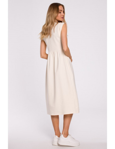 Kreminės spalvos suknelė